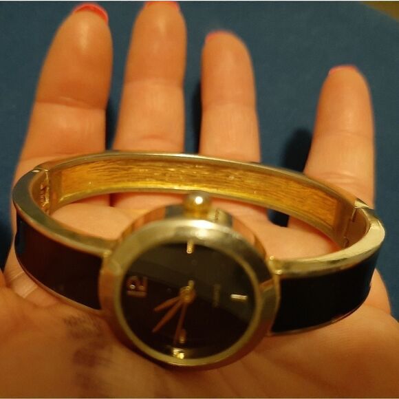 Black and silver hinged bangle watch main image 8